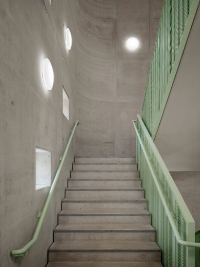 Concrete stairwell within university building by Behles & Jochimsen