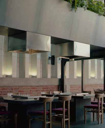 Metal vents above dining area