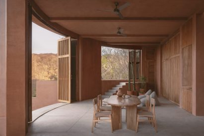 Pink stucco-lined living room