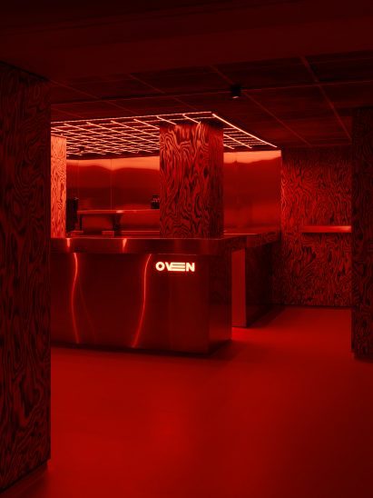 Red-lit nightclub interior