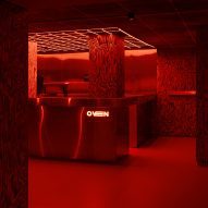Red-lit nightclub interior