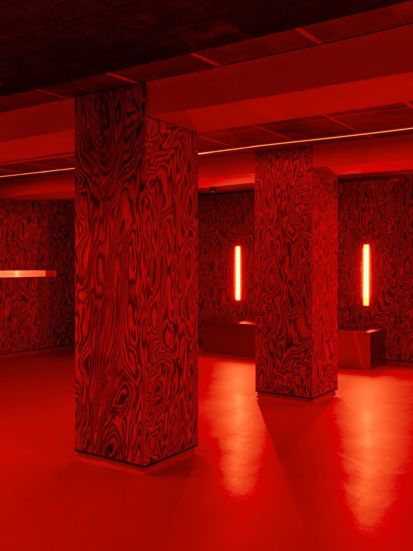 Red-lit nightclub interior