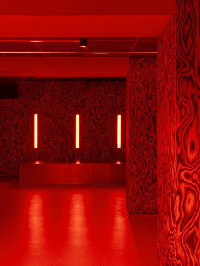Red-lit nightclub interior
