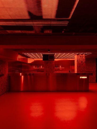 Red-lit nightclub interior