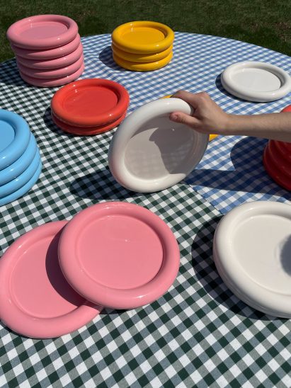 Chubby plates on picnic blanket by Gustaf Westman