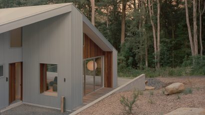 View of entrance to fire-resistant home by Klaus Carson Studio