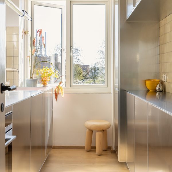 Galley kitchen with metal cabinets on either side