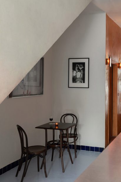 Bar interior with seats and table in nook