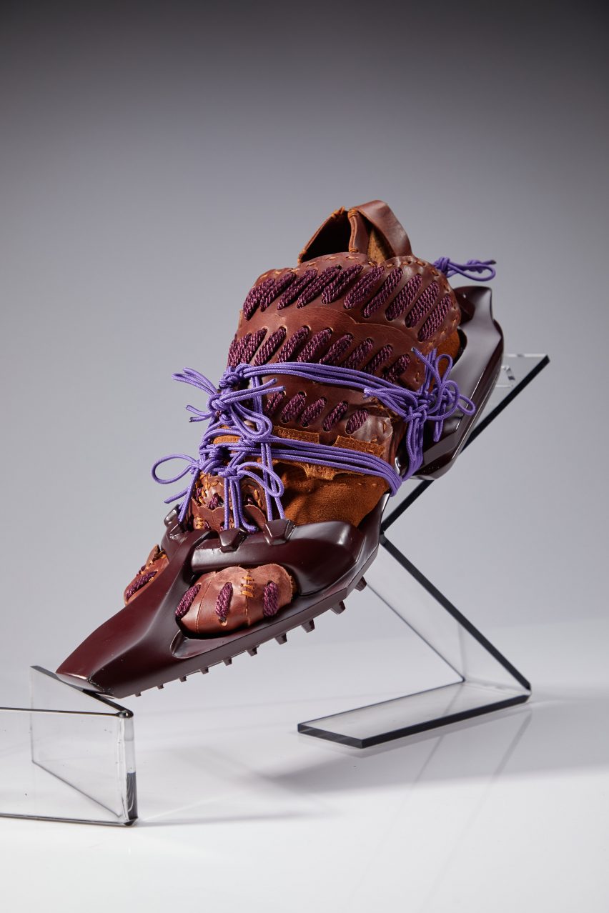 a photograph of a model of a shoe in tones of brown