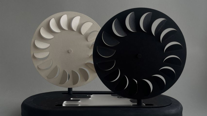 a photograph of two circular fans in tones of black and white
