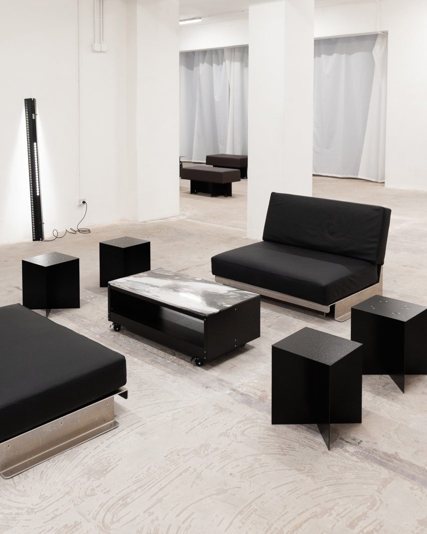 Leather and steel chairs in Milan gallery