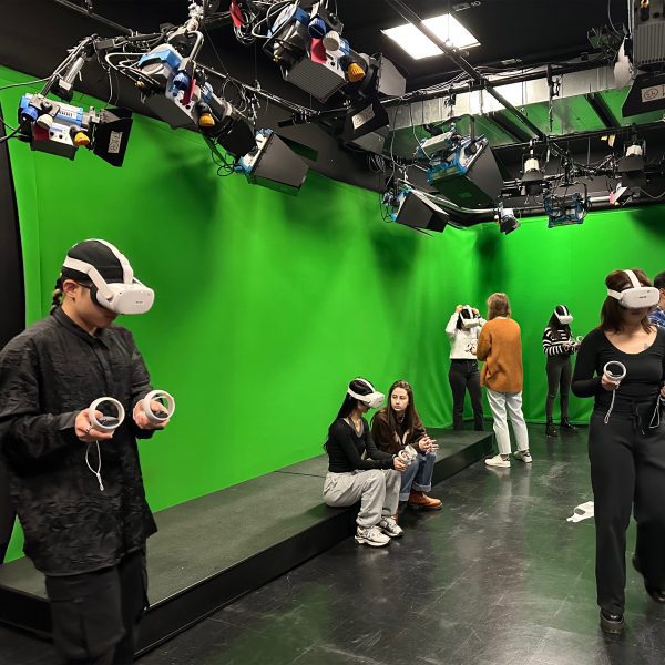 a photograph of students wearing VR headsets