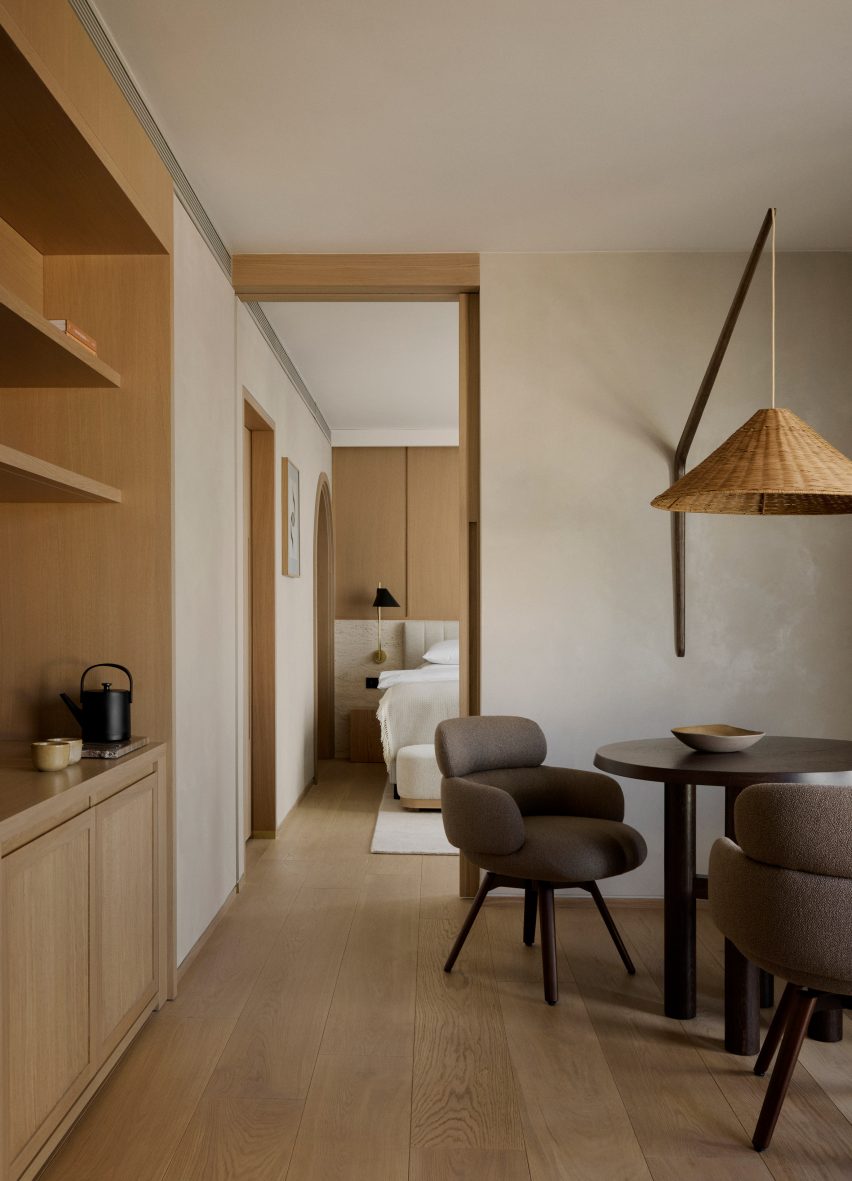 Living space and bedroom in Puro Warsaw guest room