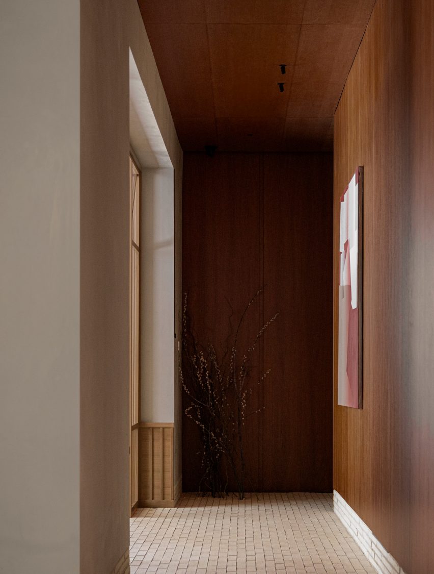 Corridor with wood-panelled walls