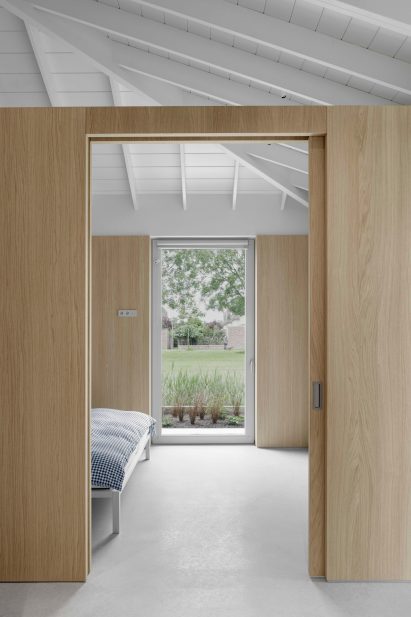Wood-lined bedroom