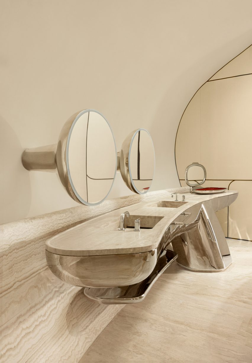 Bathroom with curved sink