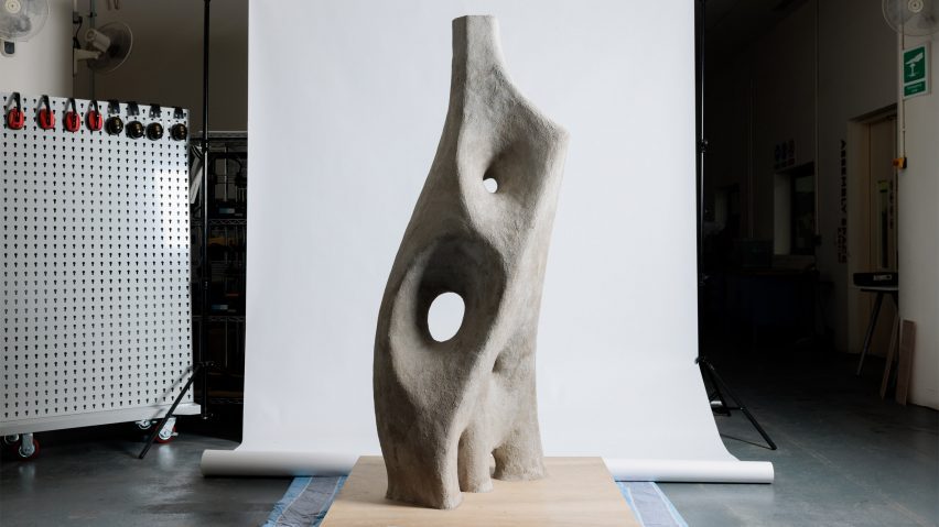 a photograph of a grey concrete sculpture