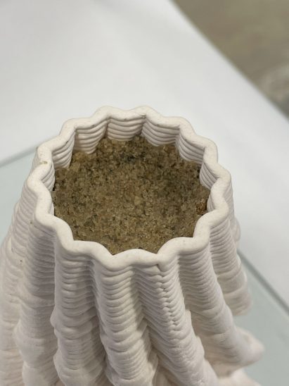 3D-printed wall aprtition filled wiht sand