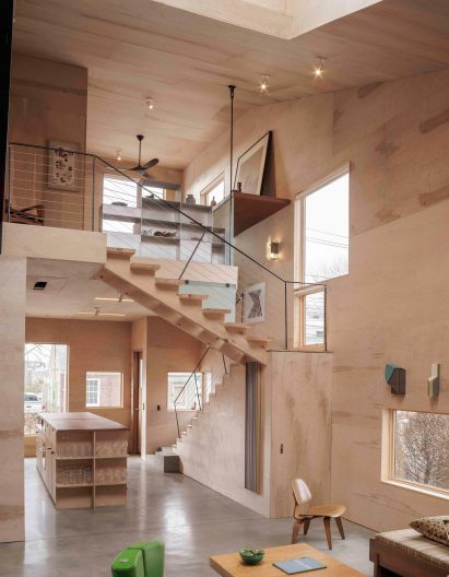 Lofted bedroom in plywood interior