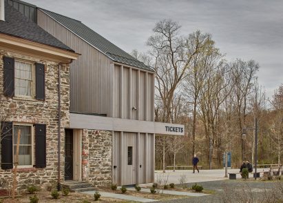 Grey and stone clad building