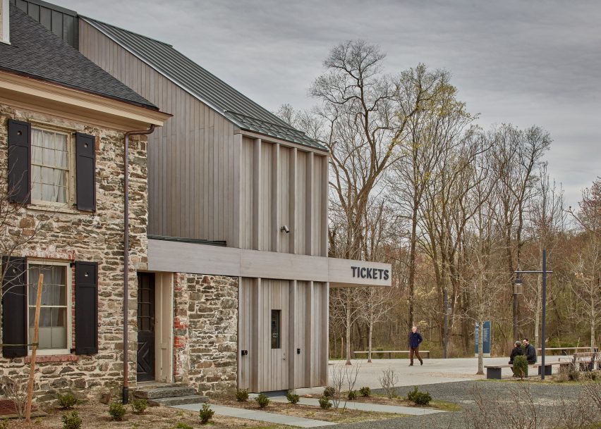 Grey and stone clad building
