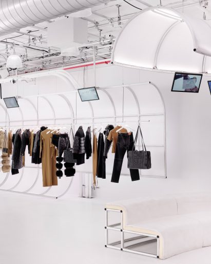 Telfar products on display within an all-white interior