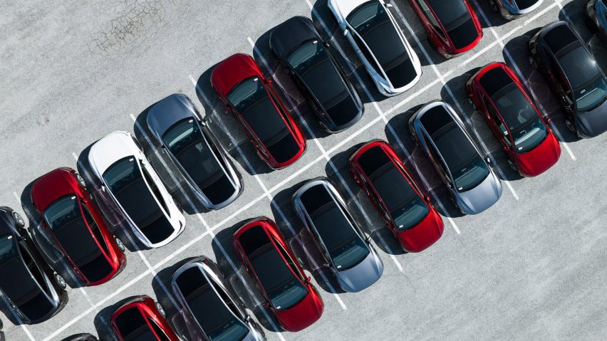 Cars lined up in parking lot