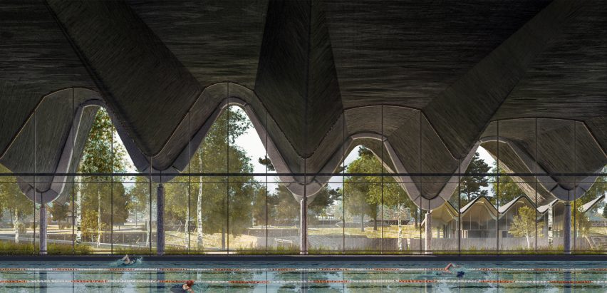 a photograph of an indoor swimming pool