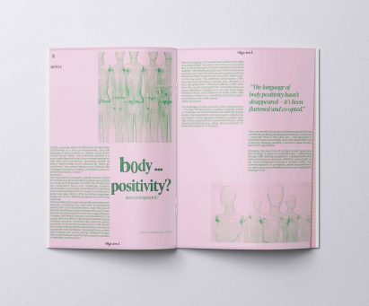 a photograph of an open book in tones of pink and green