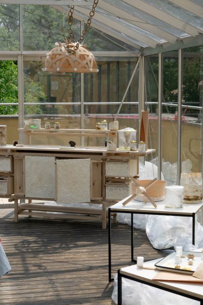 a photograph of a construction workshop in tones of beige