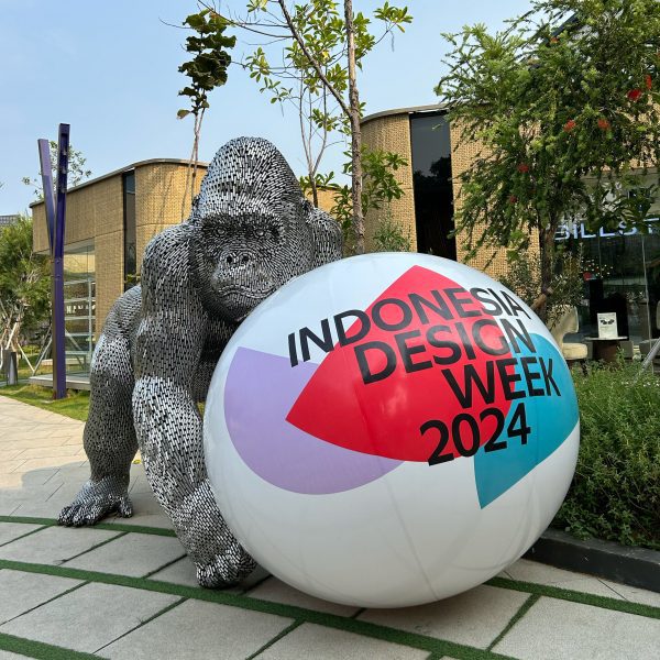 Photo of Indonesia Design Week ball next to a statue