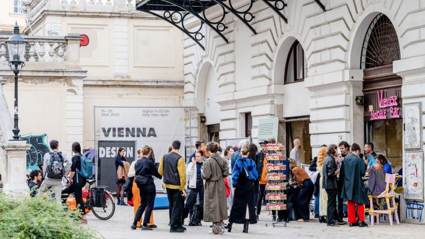 Photo of people stood outside building in Vienna