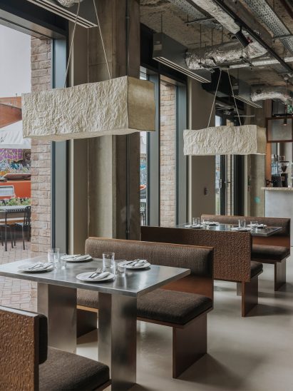 Booth seating in Canal restaurant by A-nrd