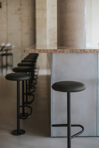 Raw edged stone counter in London restaurant