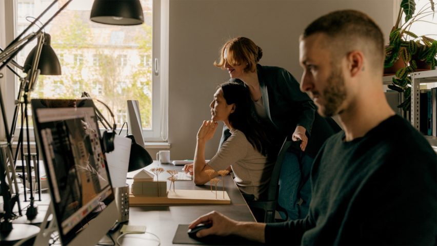 a photograph of students working on computers
