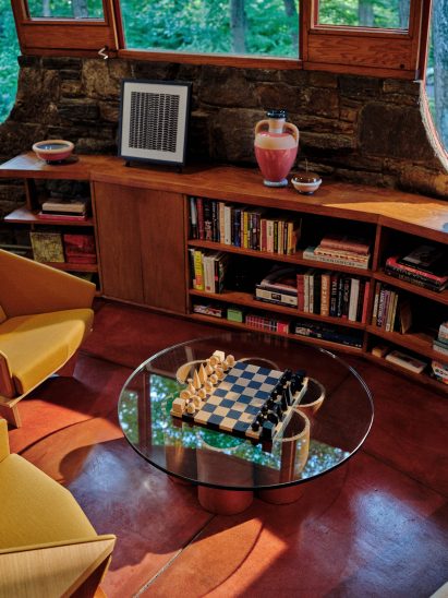 Chess set on top of a circular glass table