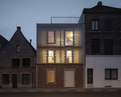 Glass-brick home lit from within
