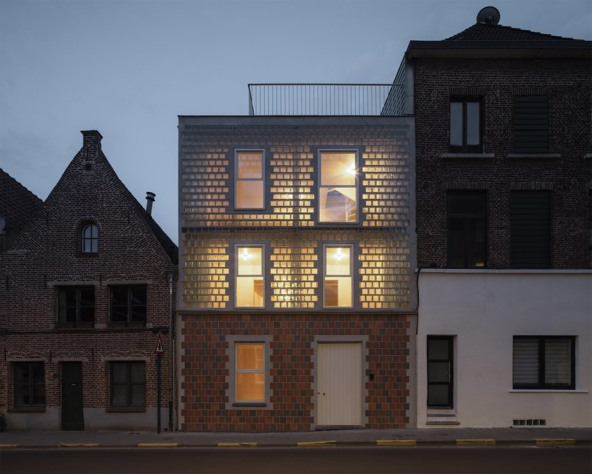 Glass-brick home lit from within