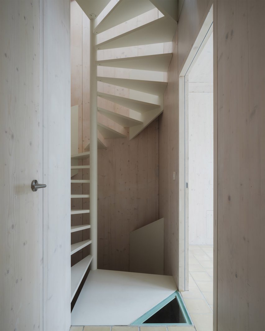 Spiral staircase in pale wood