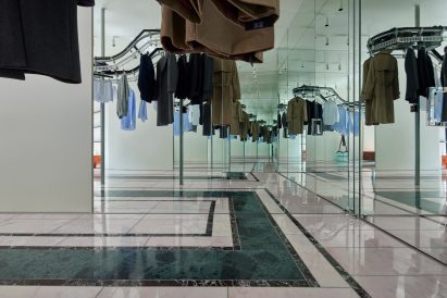 Striped marble flooring reflected in mirrors