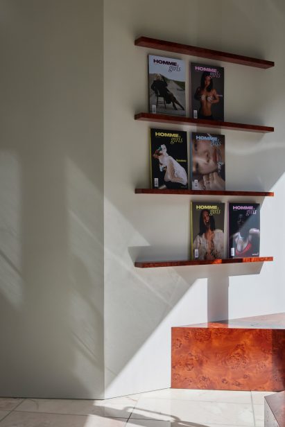 Burl wood shelves presenting magazine print issues