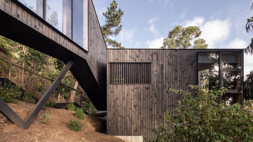 Chilean house with black bridge