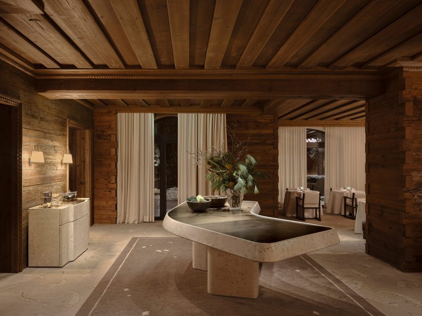 Buffet table in wood-clad interior