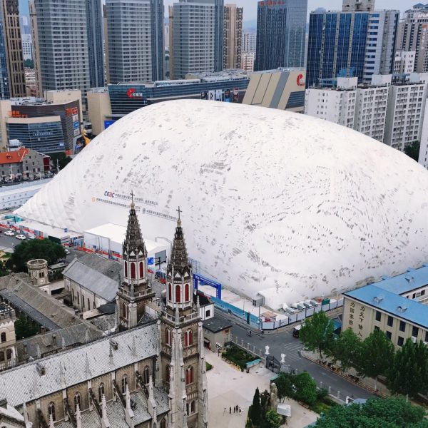 Inflatable dome next to church in Jinan