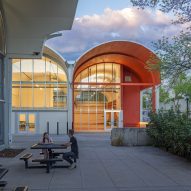 Vaulted arts hub with orange