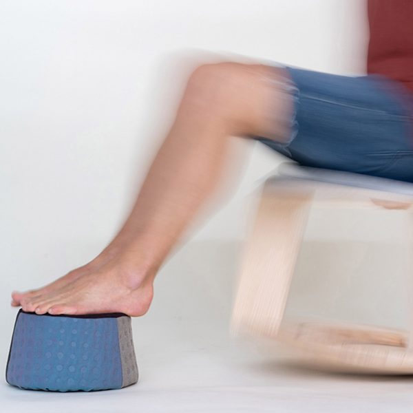a photograph of a person on a rocking chair