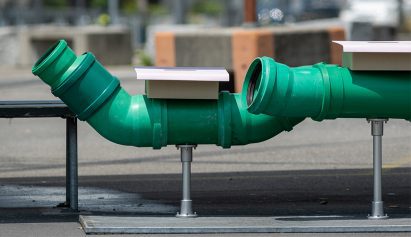 a photograph of drain pipes in green tones