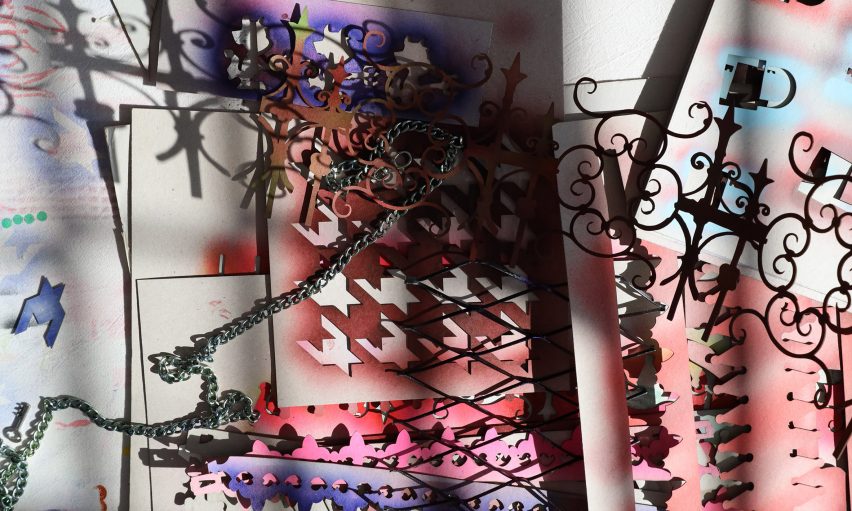 a photograph of a collage in tones of red, purple, black and white