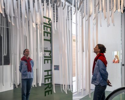 A mirrored wall in Meet Me Here exhibition by Spacon at the Danish Architecture Center