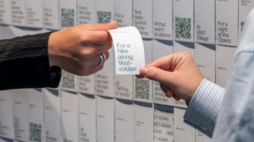 Paper slips suggest meeting spaces around Copenhagen, with QR codes, in Meet Me Here exhibition by Spacon at the Danish Architecture Center